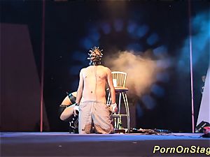 wild fetish injection needle show on stage